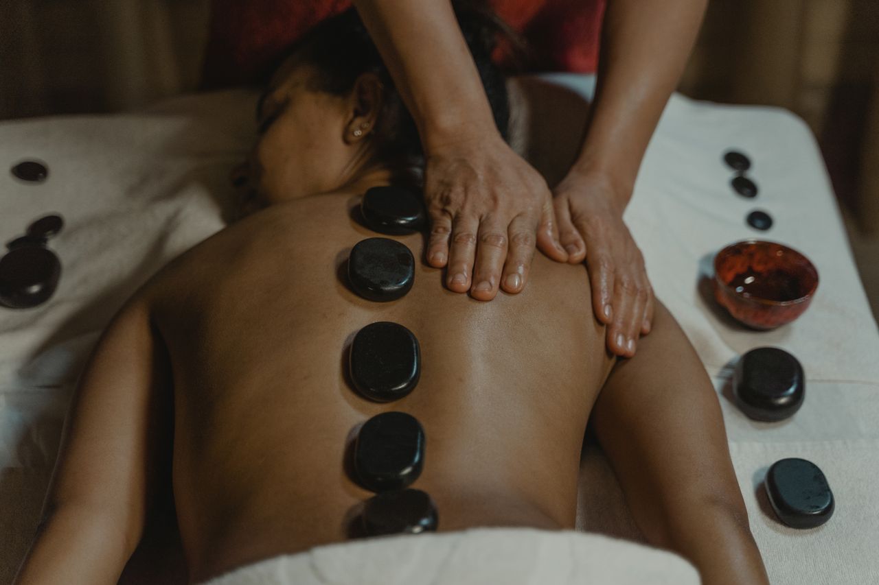services-03 Experience ultimate relaxation with a rejuvenating hot stone massage enhancing well-being.